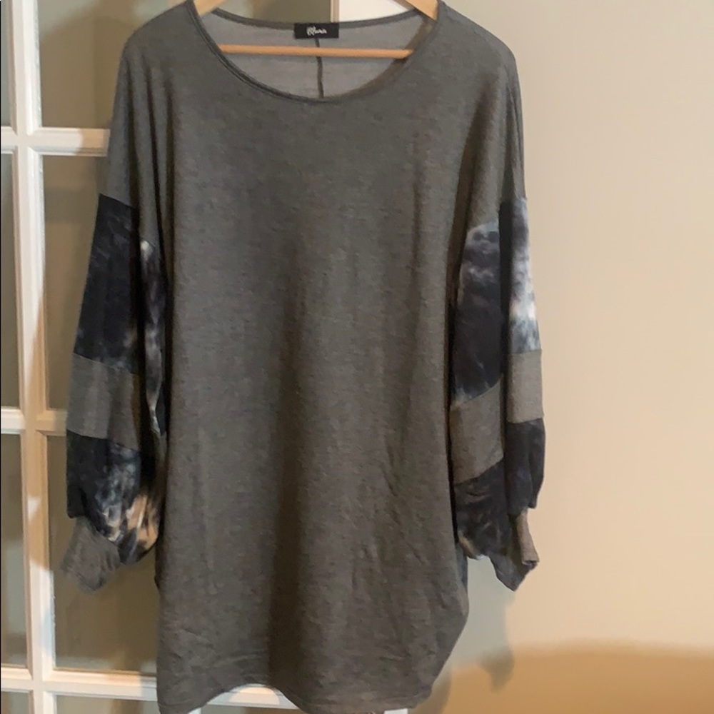 Top longer  in length